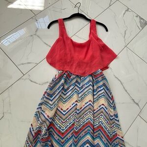 Vibrant Sleeveless Dress with Chevron Skirt